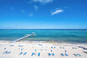On the beach, sun-loungers, beach towels