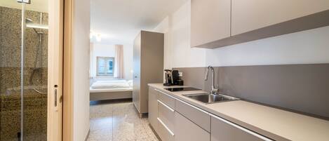 Fridge, stovetop, coffee/tea maker, electric kettle