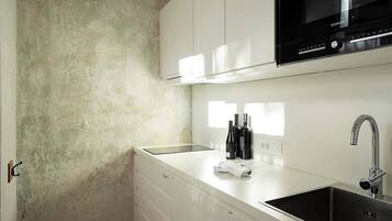 Fridge, microwave, stovetop, coffee/tea maker