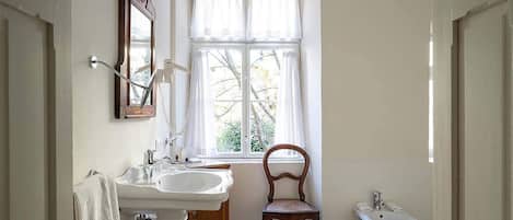 Bathtub, hair dryer, towels