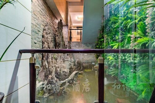 Junyi Hotel (Huaibin Mobile Building Store)