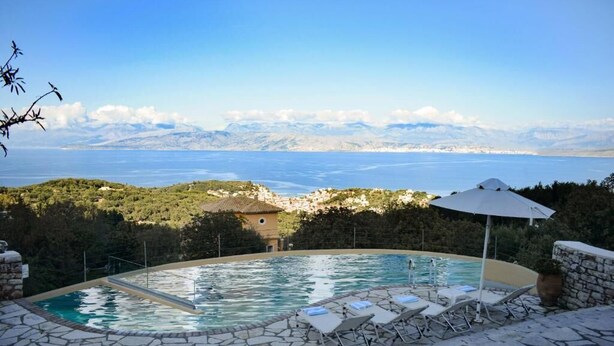 A pool with a view of a mountainous landscape and a body of water. - The Hillside Villas, Stunning Views & Private Pool (Corfu)