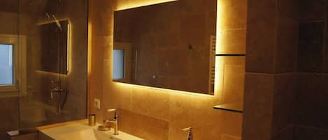 Shower, hair dryer, towels, soap