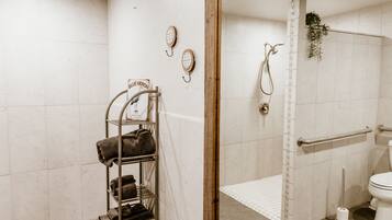 Shower, towels, soap, toilet paper