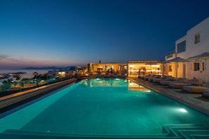 Seasonal outdoor pool, pool umbrellas, pool loungers