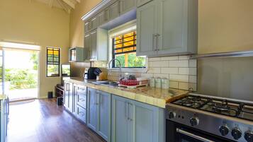 Fridge, microwave, cookware/dishes/utensils, spices