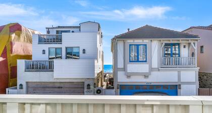 Dog-friendly 2nd-floor duplex near beach with balcony, sunroom, W/D & streaming