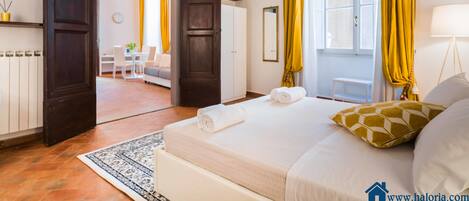 1 slaapkamer, een strijkplank/strijkijzer, gratis wifi, beddengoed