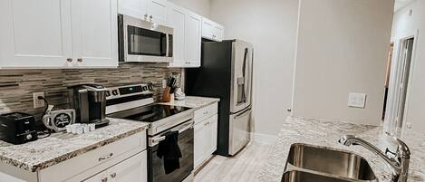 Fridge, microwave, stovetop, dishwasher