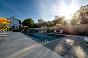 Seasonal outdoor pool, pool umbrellas, pool loungers
