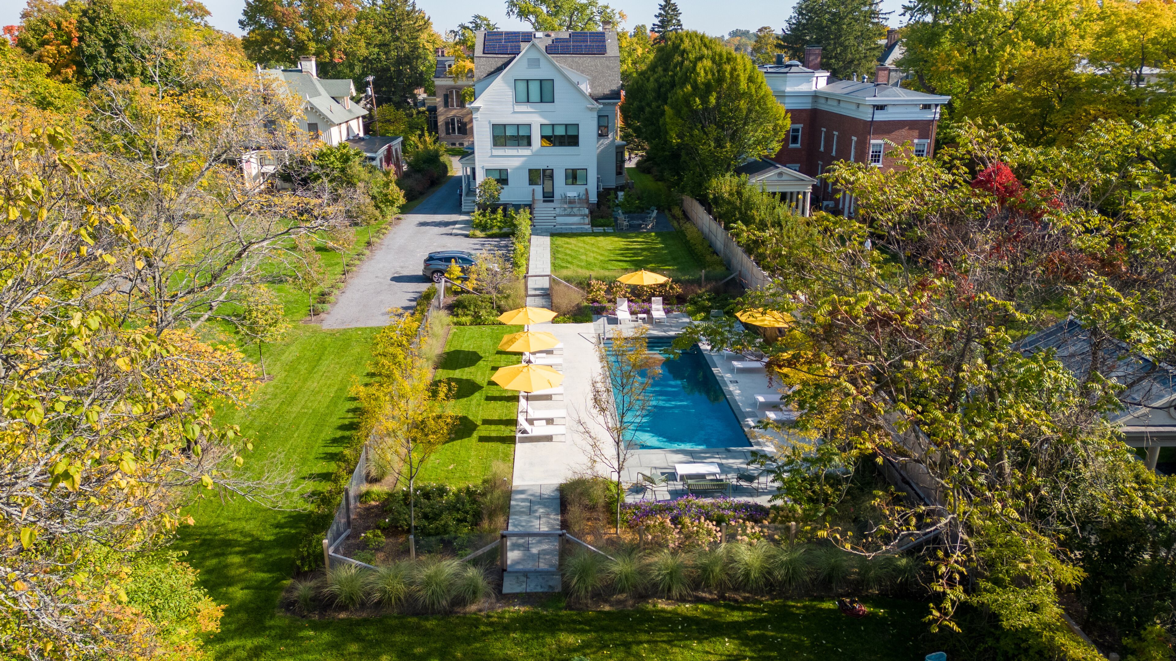 Seasonal outdoor pool, pool umbrellas, pool loungers