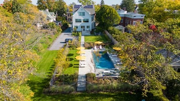 Seasonal outdoor pool, pool umbrellas, pool loungers