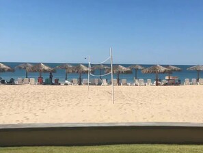 On the beach, beach towels