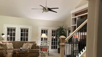 Smart TV, fireplace, books, printers