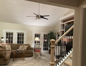 Smart TV, fireplace, books, printers