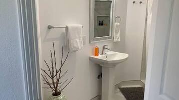 Shower, towels, soap, shampoo