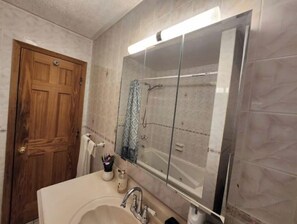Hair dryer, towels, soap, shampoo