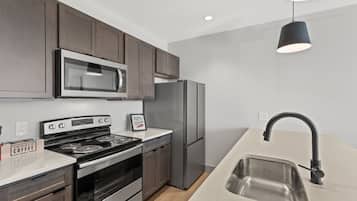 Coffee/tea maker, fridge, microwave, oven