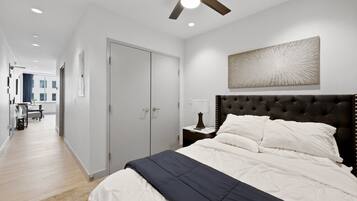 1 bedroom, desk, iron/ironing board, travel crib