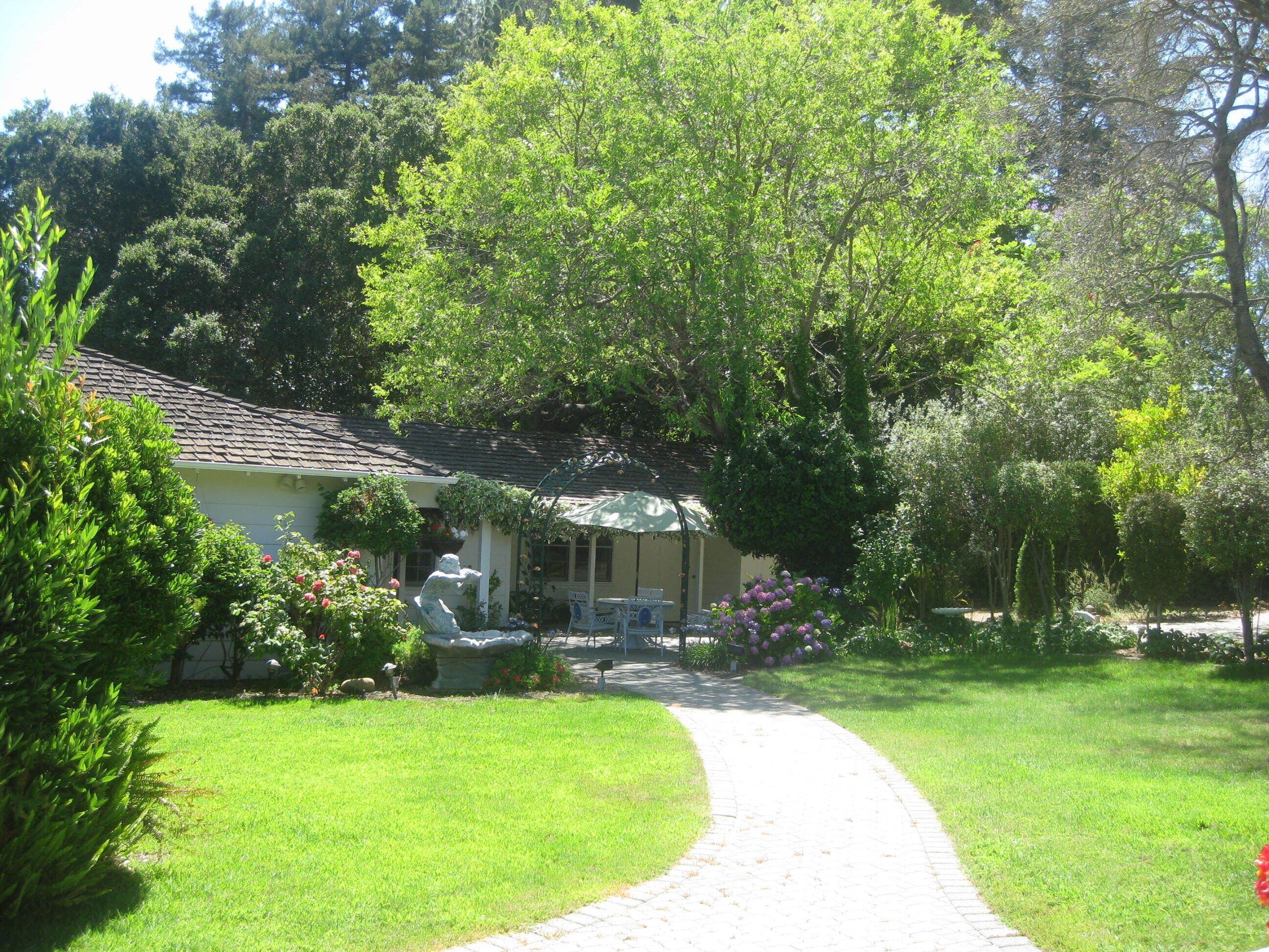 Gated Executive Home on park like Oasis in Upscale Area.