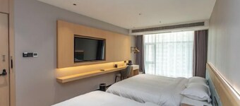 Wanjin Convenience Hotel (Beihai Qiaogang Fengqing Street)