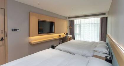 Wanjin Convenience Hotel (Beihai Qiaogang Fengqing Street)