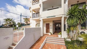 A multi-story building with a sign reading "BELLAVISTA PRIVATE." - Beautiful apartment in Mijas with swimming pool (Mijas)