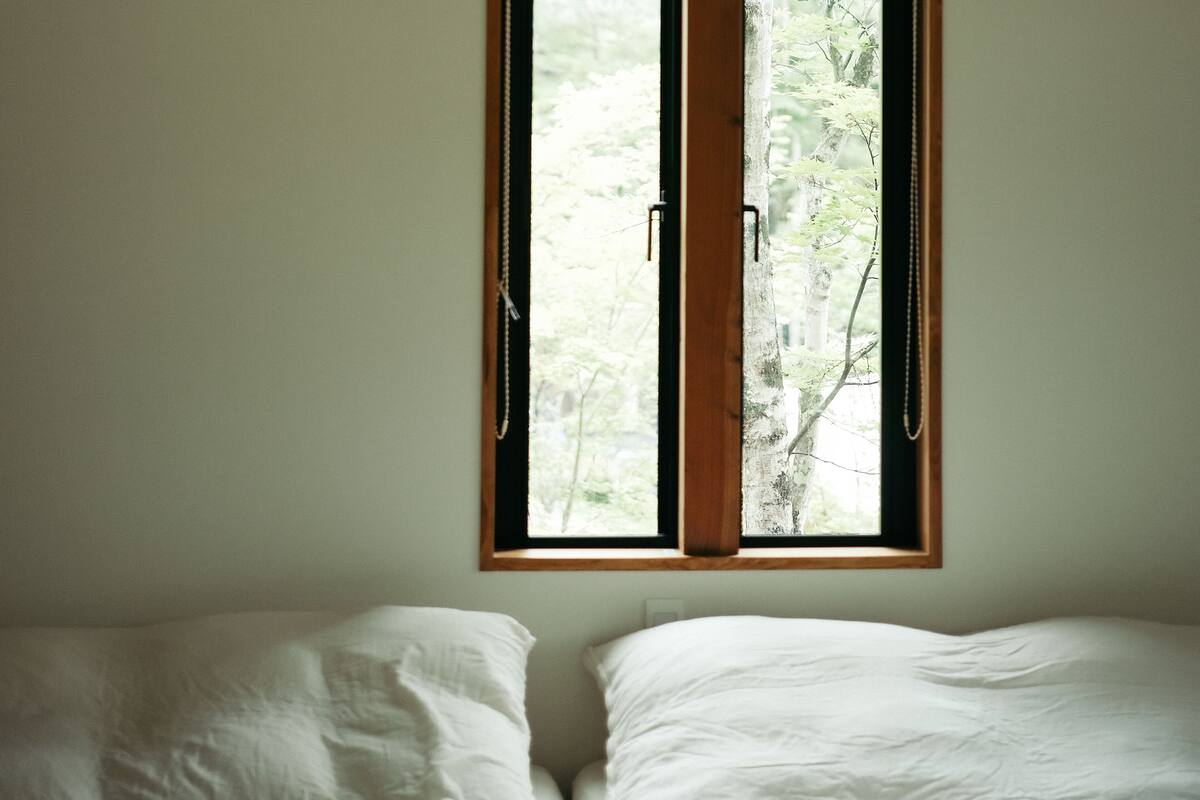 Premium bedding, down duvets, desk, laptop workspace