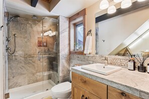Bathtub, hair dryer, towels