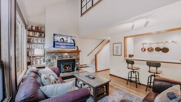 Apartment (2 Bedrooms) | Living area | Fireplace, ping pong