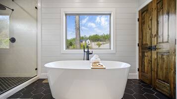 Bathtub, hair dryer, towels