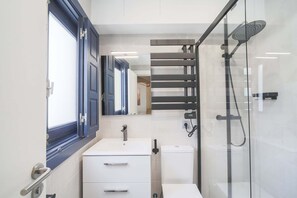 Bathtub, hair dryer, towels, soap
