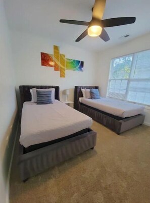 3 bedrooms, desk, iron/ironing board, travel crib