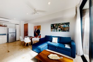 TV - Dog-friendly luxe apartment in a great location with a pool, gym, & balcony (Playa del Carmen)