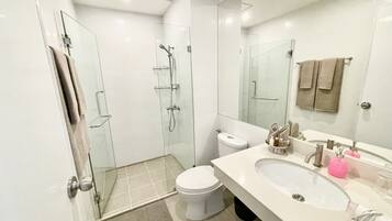 Hair dryer, towels, soap, shampoo