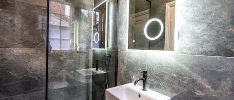 Shower, hair dryer, towels