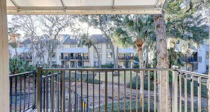 Relaxing condo with tennis court, pool, balcony, patio, kitchen, W/D, & kitchen