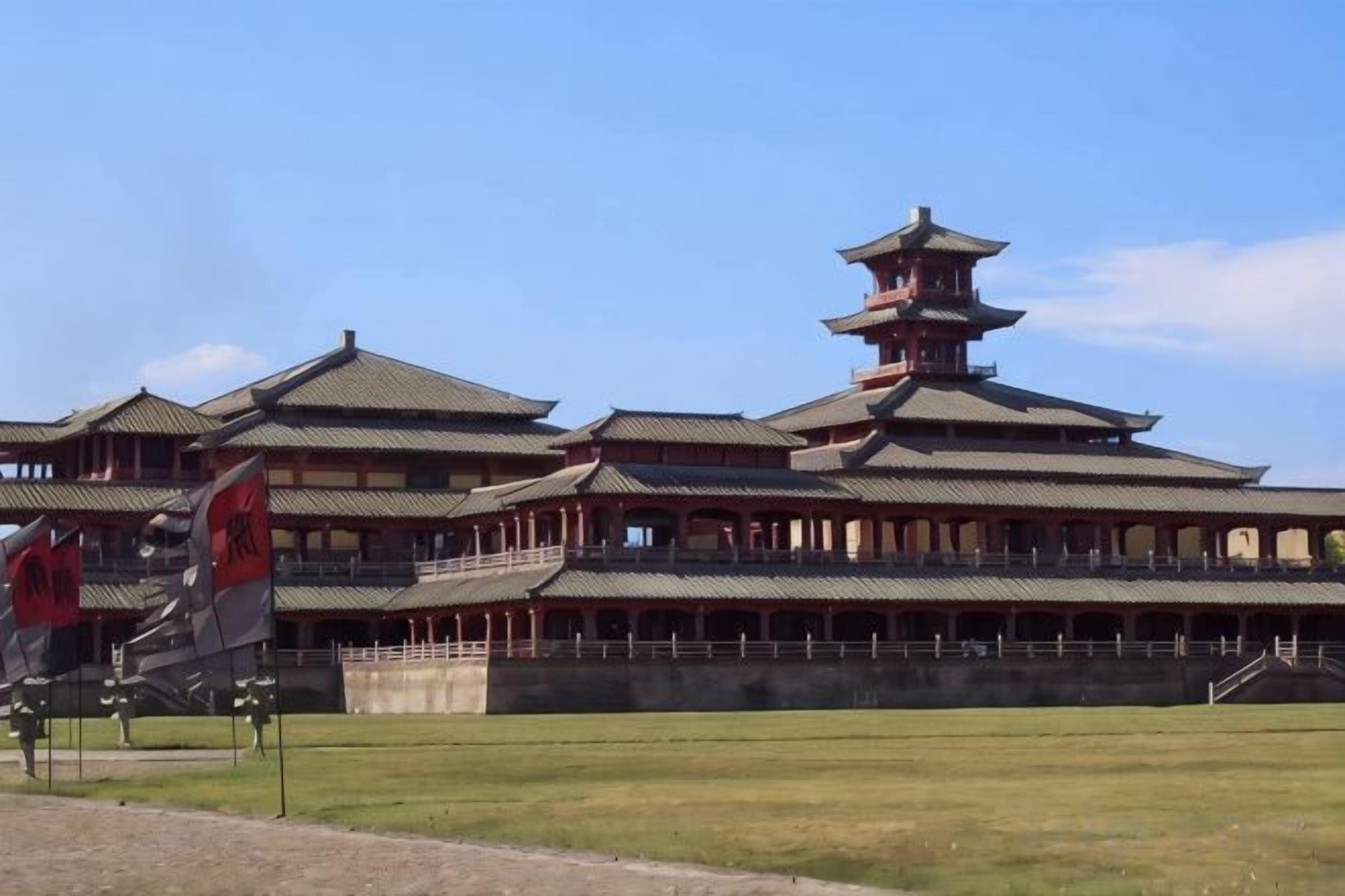 A traditional multi-tiered building with a symmetrical roofline and multiple levels.
