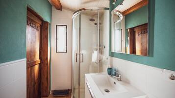 Bathtub, hair dryer, towels