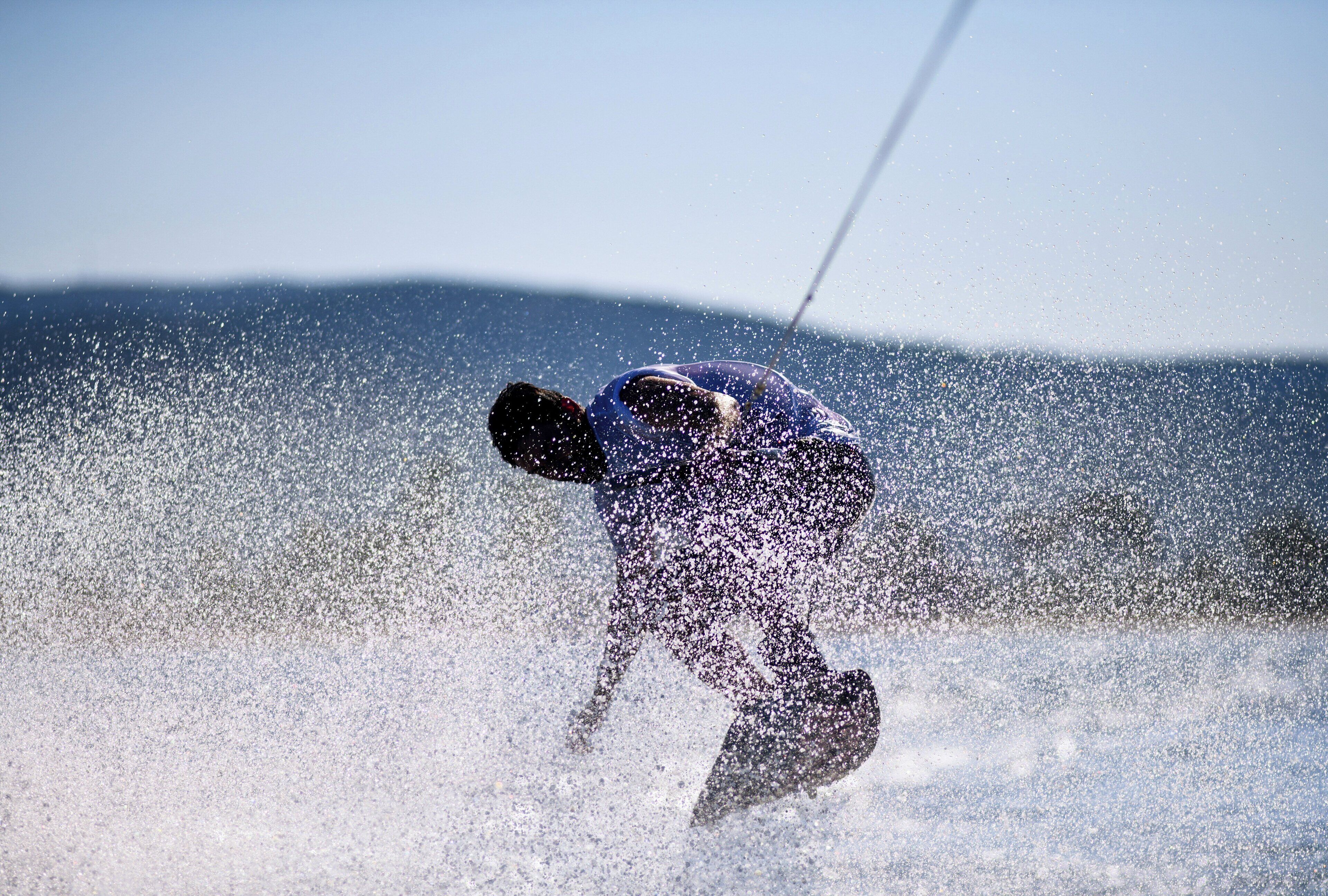 A person surfing on a wave.