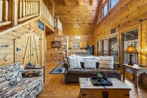 Televisión, chimenea, reproductor de DVD, futbolito