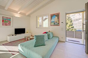 Family Apartment, Multiple Bedrooms, 2 Bathrooms, Mountainside (Mirabelle) | Living area | 21-inch Smart TV with cable channels - Mirabelle (Dro)