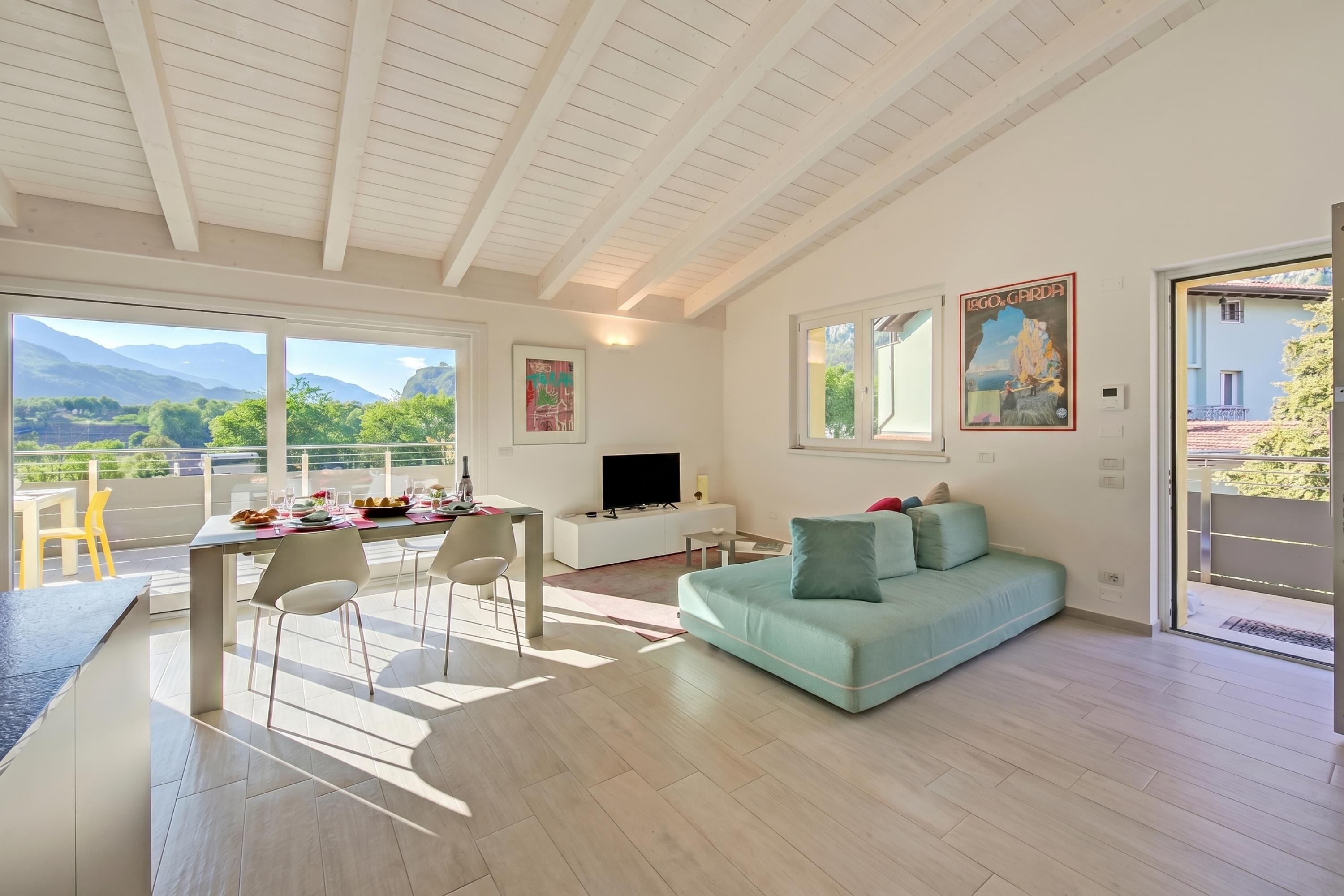 Family Apartment, Multiple Bedrooms, 2 Bathrooms, Mountainside (Mirabelle) | Living area | 21-inch Smart TV with cable channels