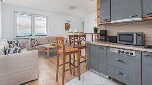 Apartment, 1 Bedroom, Balcony, Sea View | Private kitchenette | Coffee/tea maker, microwave, electric kettle, toaster - Beachfront Apartment by Renters (Miedzyzdroje)