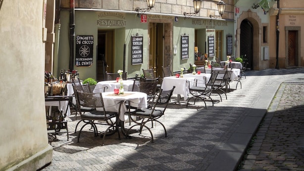 A historic building with a restaurant and a hotel. - Black Star Suites (Prague)