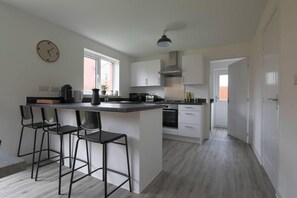 House, Multiple Beds | Private kitchen | Fridge, microwave, oven, stovetop