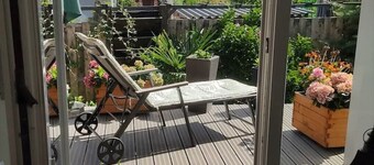 Modern vacation home with lake view and fireplace