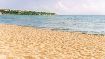 Beach nearby, sun-loungers, beach umbrellas