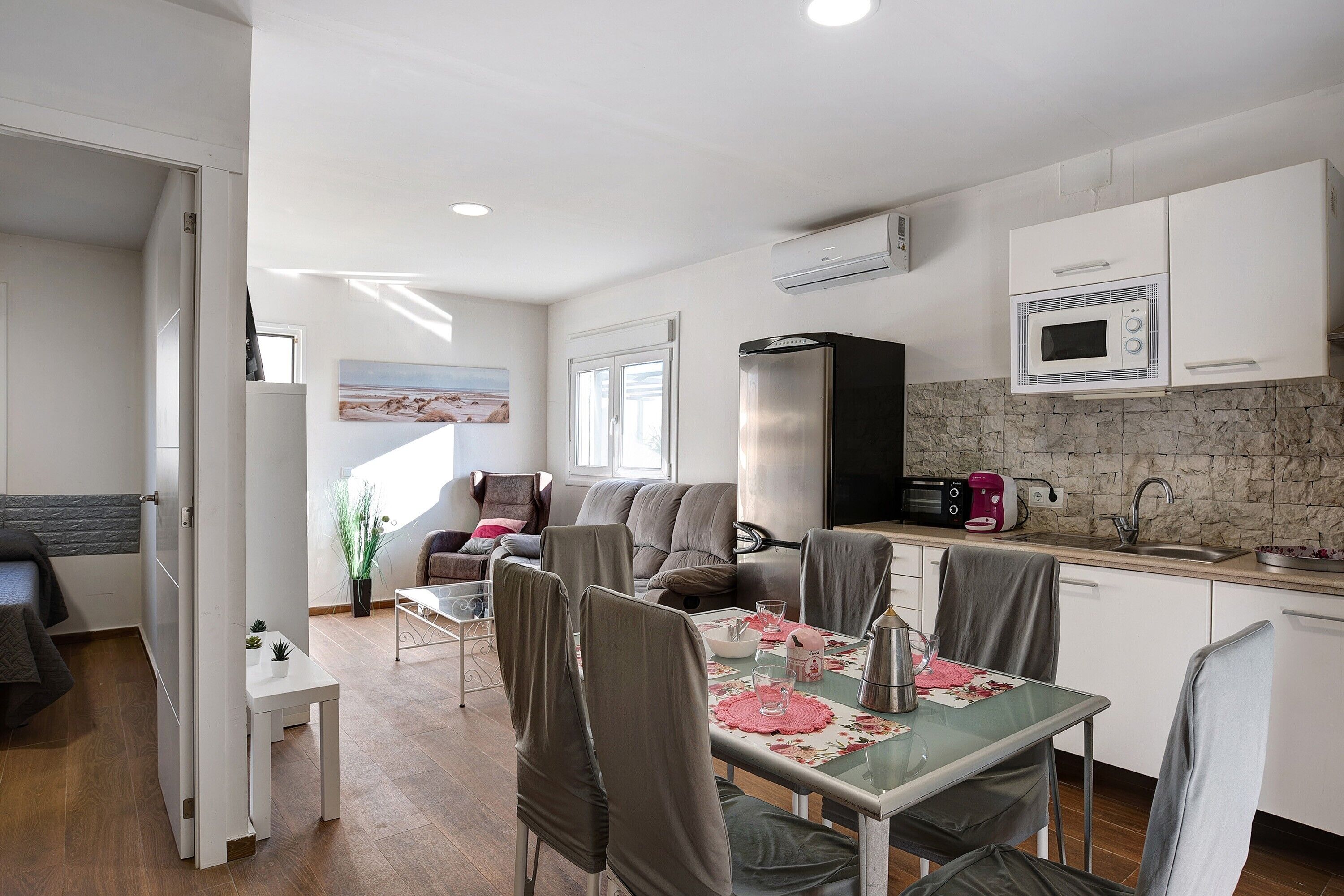 Fridge, microwave, stovetop, coffee/tea maker