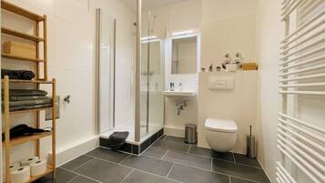 Shower, towels, soap, shampoo